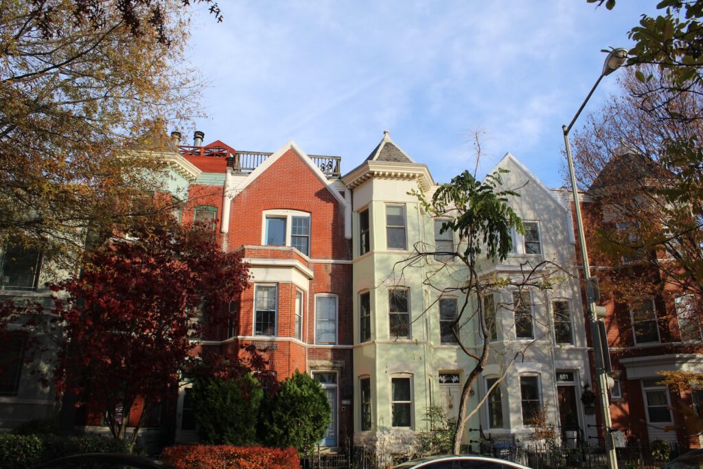 a row of multi - family houses in a residential area