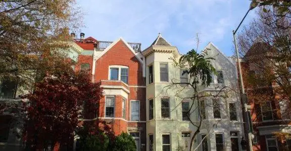 a row of multi - family houses in a residential area
